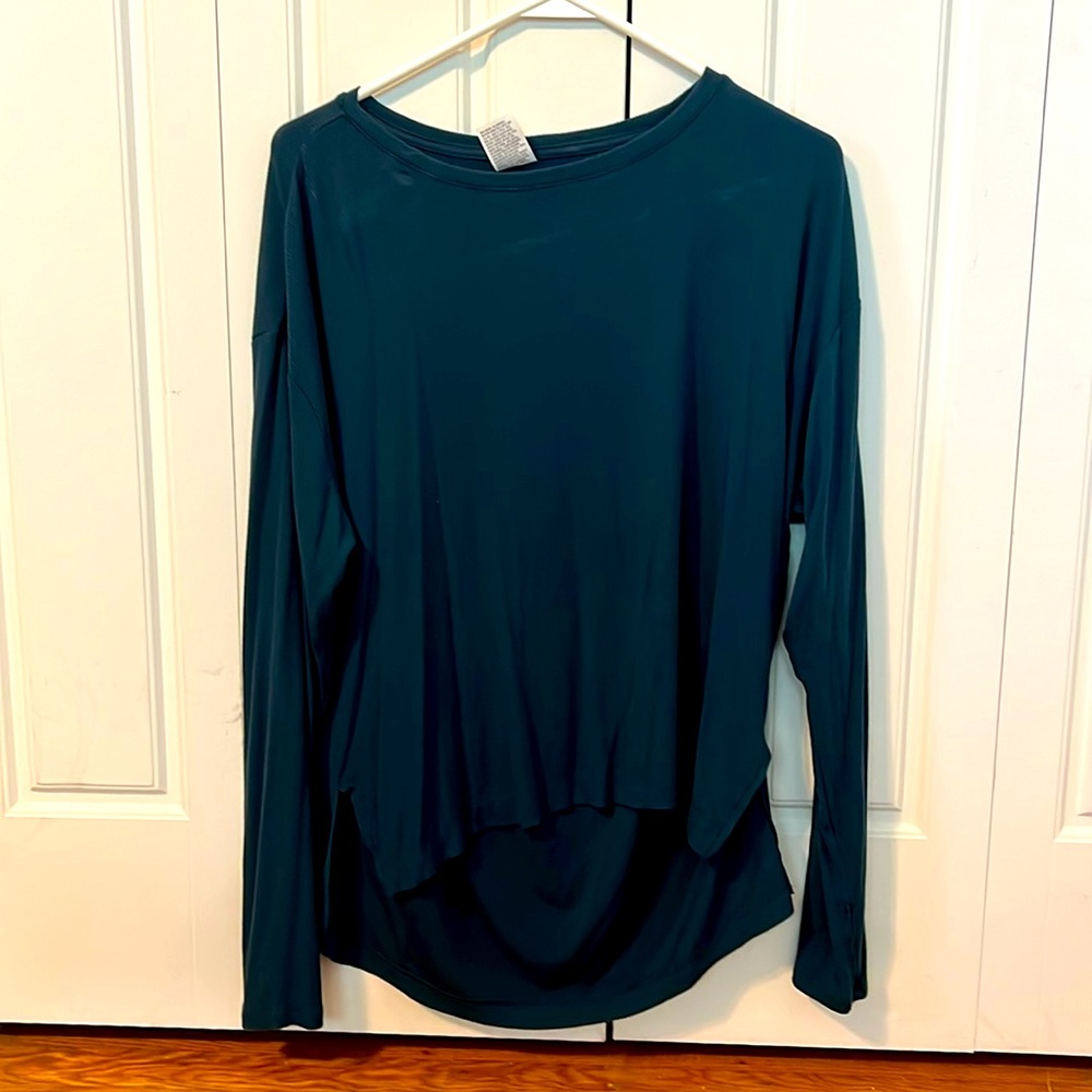 All in motion teal long sleeve work out top.